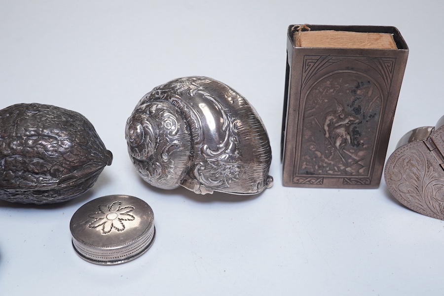 An Edwardian pierced silver small pot pourri? box by William Comyns, London, 1908, 45mm(a.f.) together with six other assorted boxes/cases including a white metal and German 800 standard and a sovereign case. Condition -